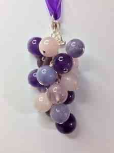 ASMR fidget charm made of purple beads.