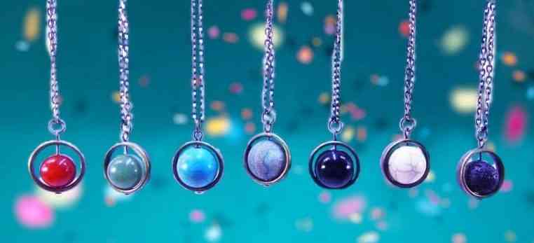 Spinner necklaces made with natural gemstones.