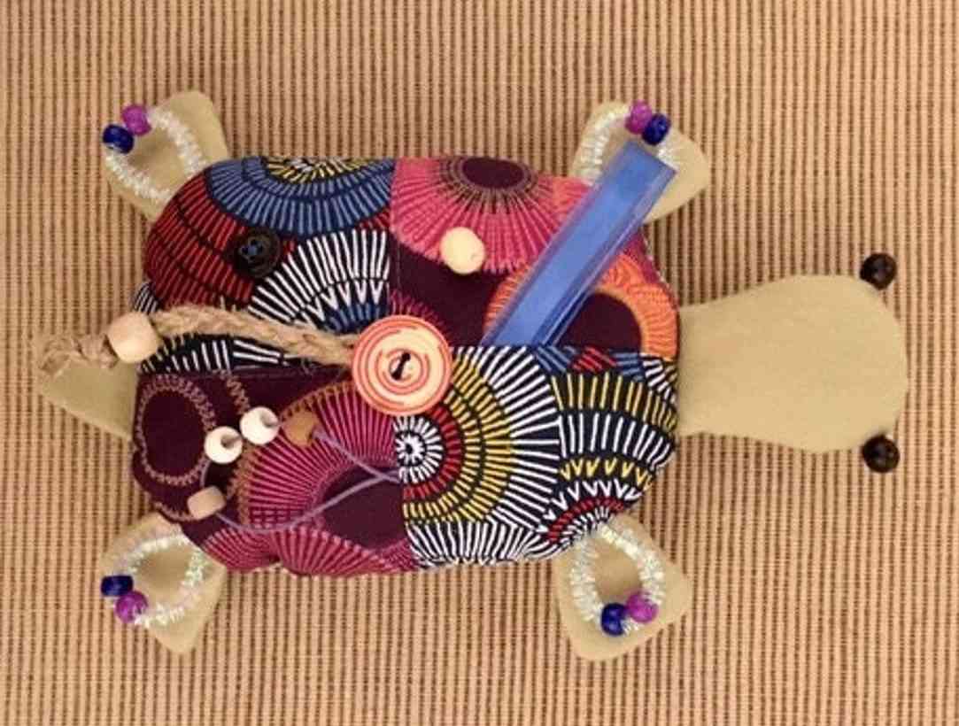 Turtle fidget pillow for elderly Alzheimer's patients and adults on the autism spectrum.