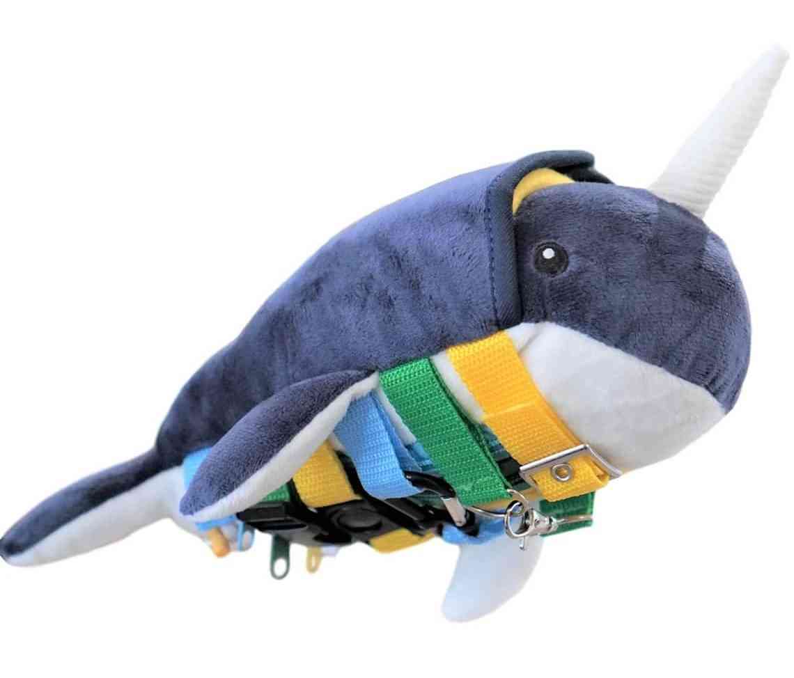 Narwhal sensory pillow with buckles.