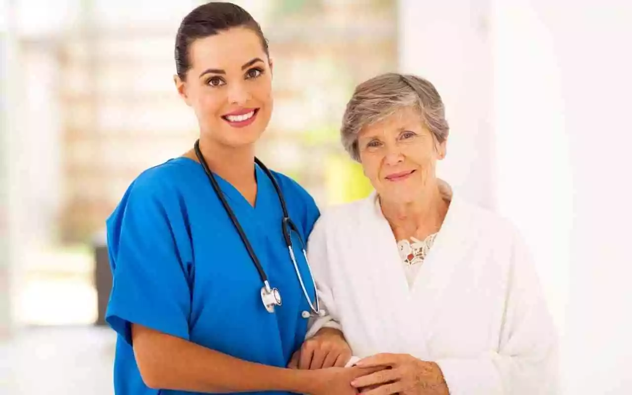 Nurse and senior citizen.