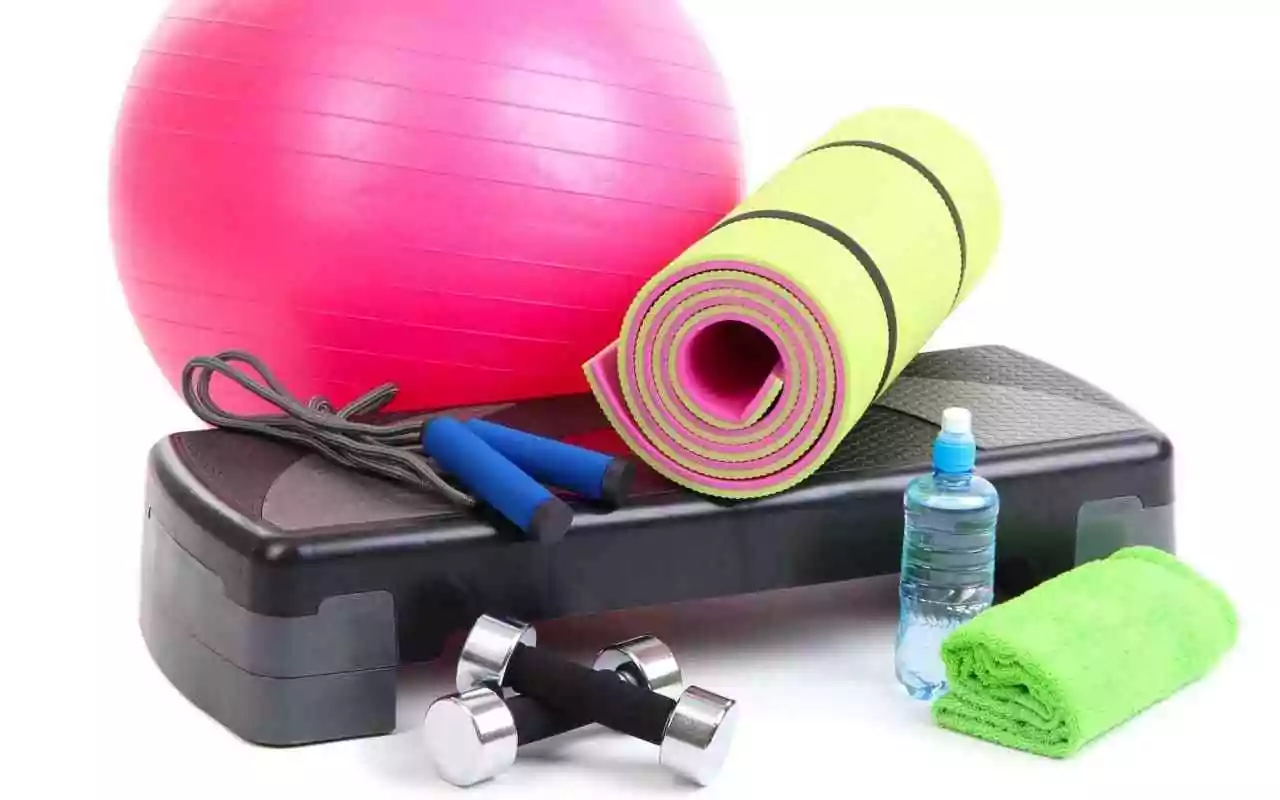 Items to maximize your workout performance. Exercise ball, mat, weights, dumbbells, jump rope.
