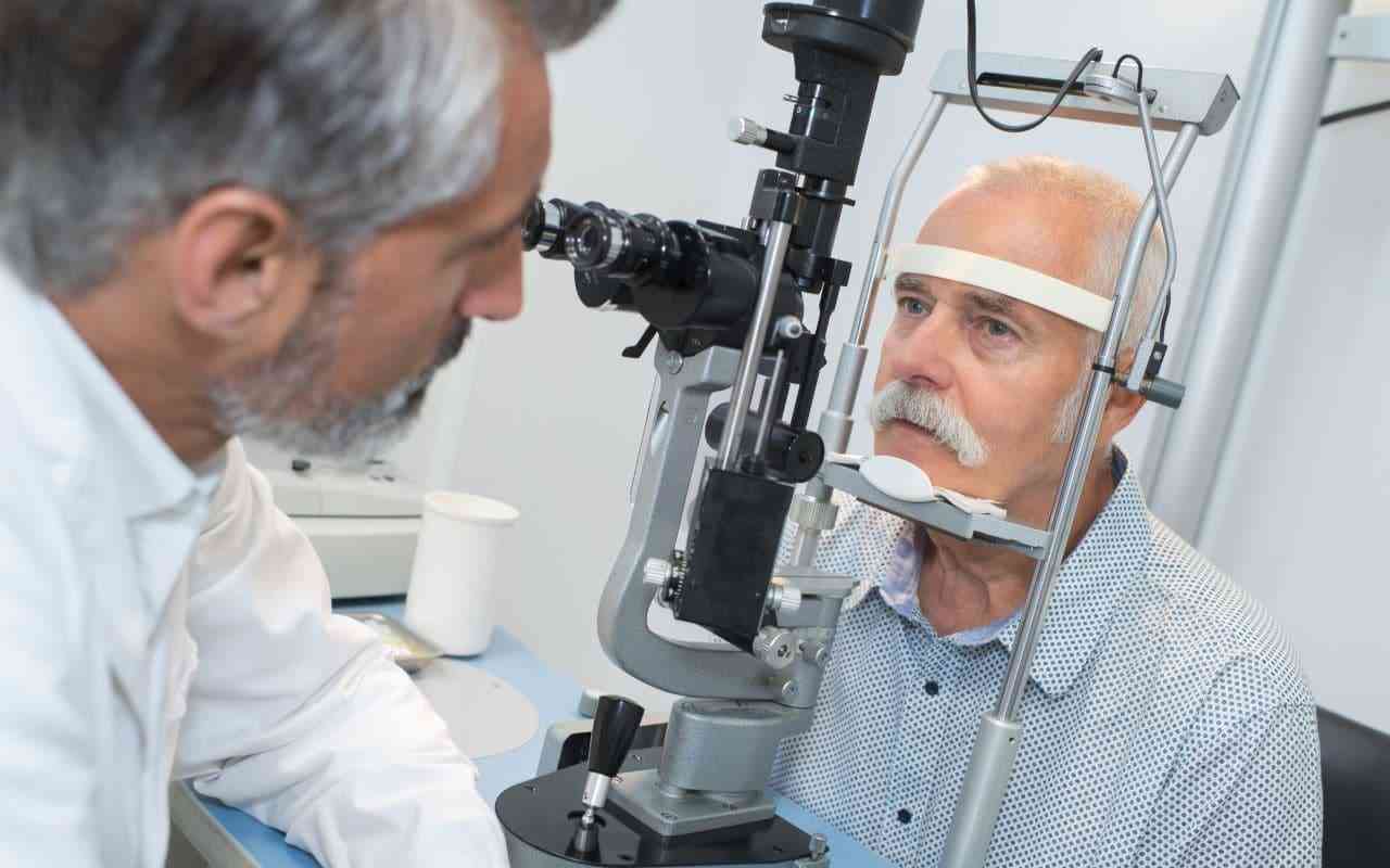 Man getting eye exam to check for cataracts